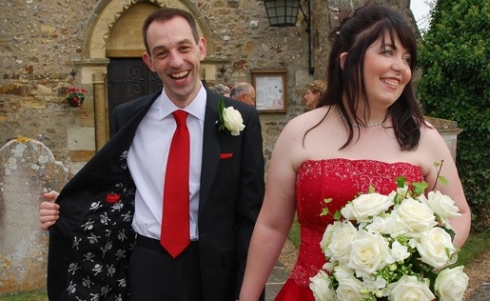The Groom flashes the guests.